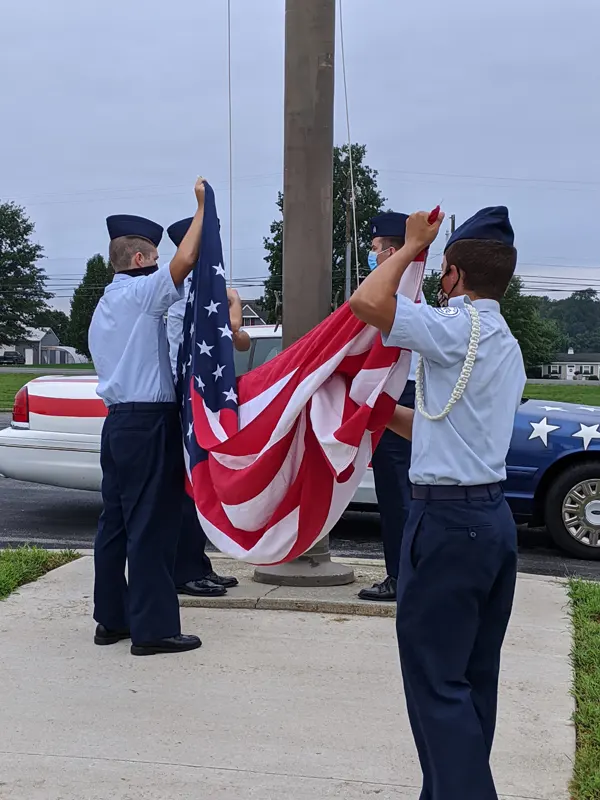 ROTC students folding the American flag